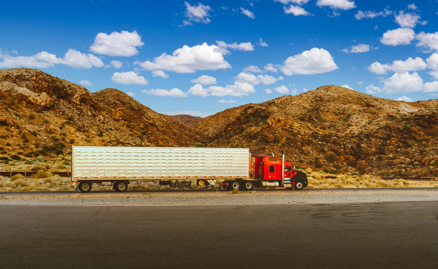 Red semi truck on highway